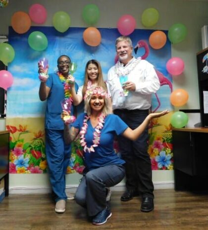Omega Health & Wellness team celebrating patients in Jacksonville, FL